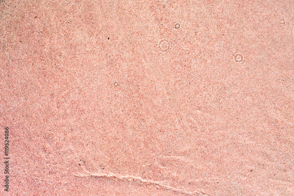 Fototapeta premium background of pink sand on the beach