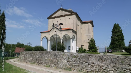 in italy  meina  ancient   religion  building    for catholic and clock tower. photo