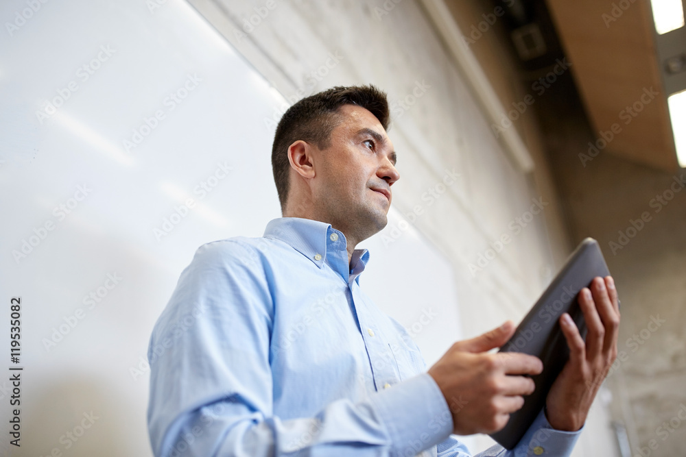 teacher or lector with tablet pc at lecture teacher or lector with tablet pc at lecture
