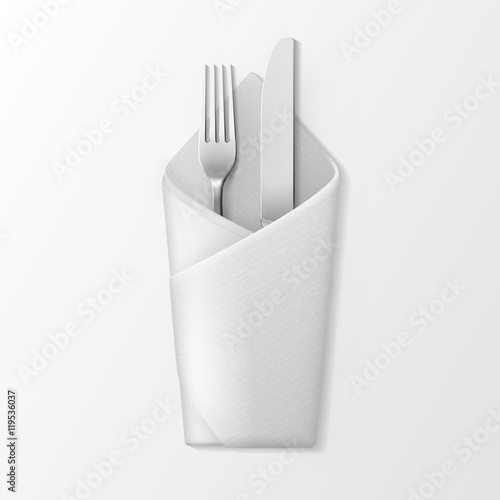 Folded Envelope Napkin with Silver Fork and Knife. Table Setting