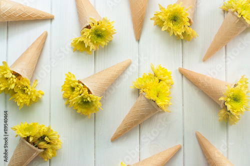 Ice cream waffle cones with flowers photo