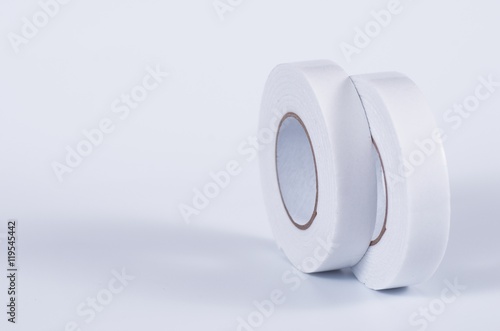 Pair roll's of double sided tape on white background. photo