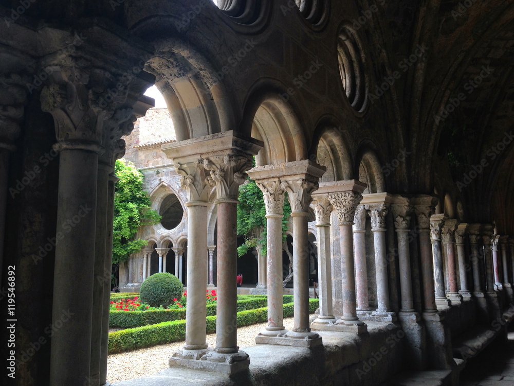 stone cloisters with Corinthian columns