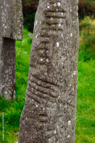 Ogham stone, Kilkalmedar, Ireland photo