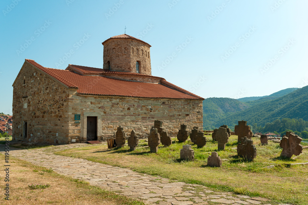 Ancient gravestones and IX century church of the Holy Apostles Peter