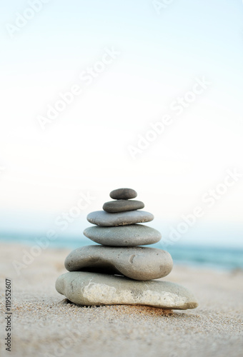 Zen stones on the sand
