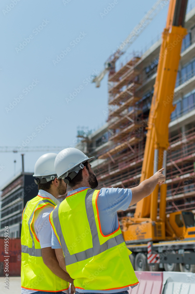 Civil engineers working during a site visit Civil engineers working during a site visit