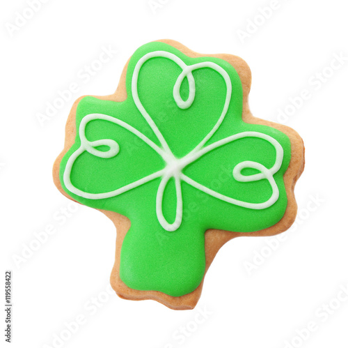 Tasty cookie in clover shape, isolated on white. Saint Patrics Day concept