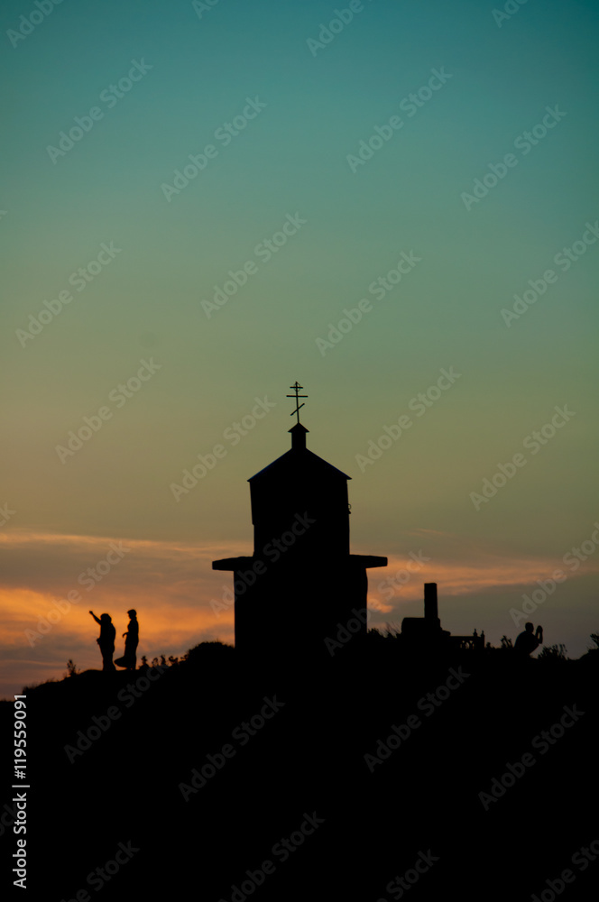Church silhouette with people