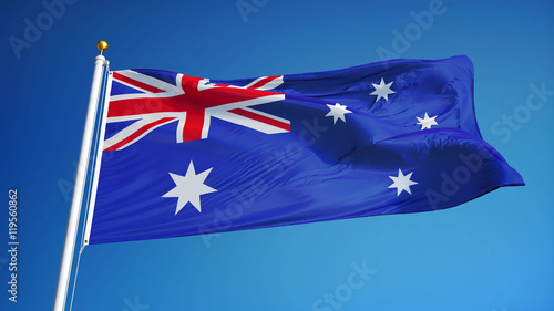 Australia flag waving against clean blue sky, close up, isolated with clipping mask alpha channel transparency, perfect for film, news, digital composition © railwayfx