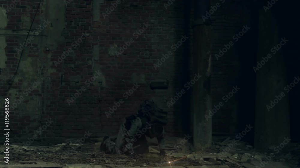 A man in military uniform with a shotgun and a backpack teleports in dark room in an abandoned factory, he finds the cube with plasma and puts it in his pocket, and then examines the place of arrival. A man in military uniform with a shotgun and a backpack teleports in dark room in an abandoned factory, he finds the cube with plasma and puts it in his pocket, and then examines the place of arrival.