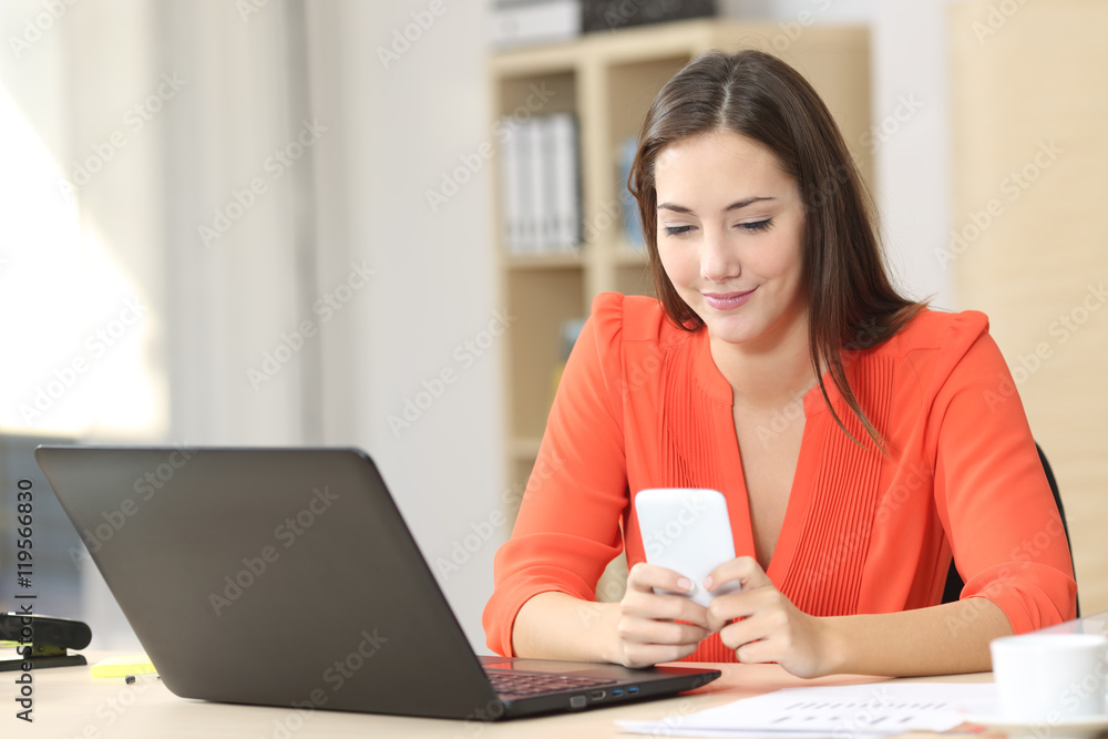 Entrepreneur working with smart phone at office Entrepreneur working with smart phone at office