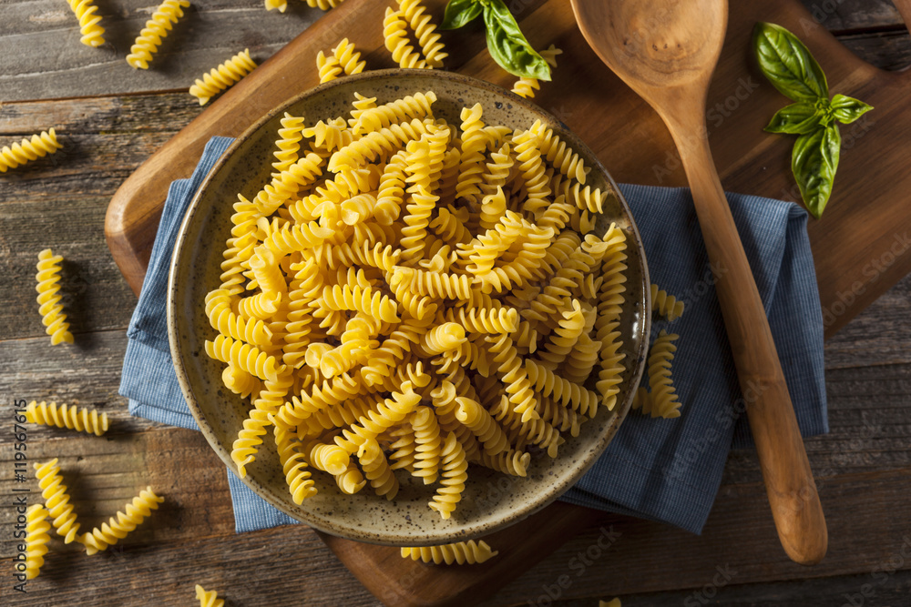 Naklejka premium Raw Dry Organic Fusilli Pasta