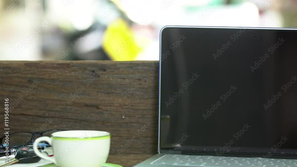 Wood desk with a laptop ,Outdoor workplace under big tree. Wood desk with a laptop ,Outdoor workplace under big tree.
