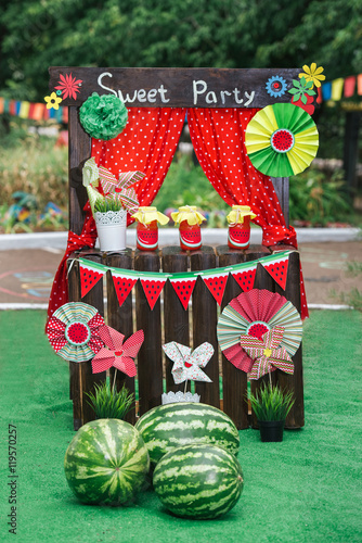 
watermelon party, watermelon jam jars , showcase , bar , props , watermelon / , bright, colorful , scenery , praznik , birthday , summer, green grass , watermelon slices photo