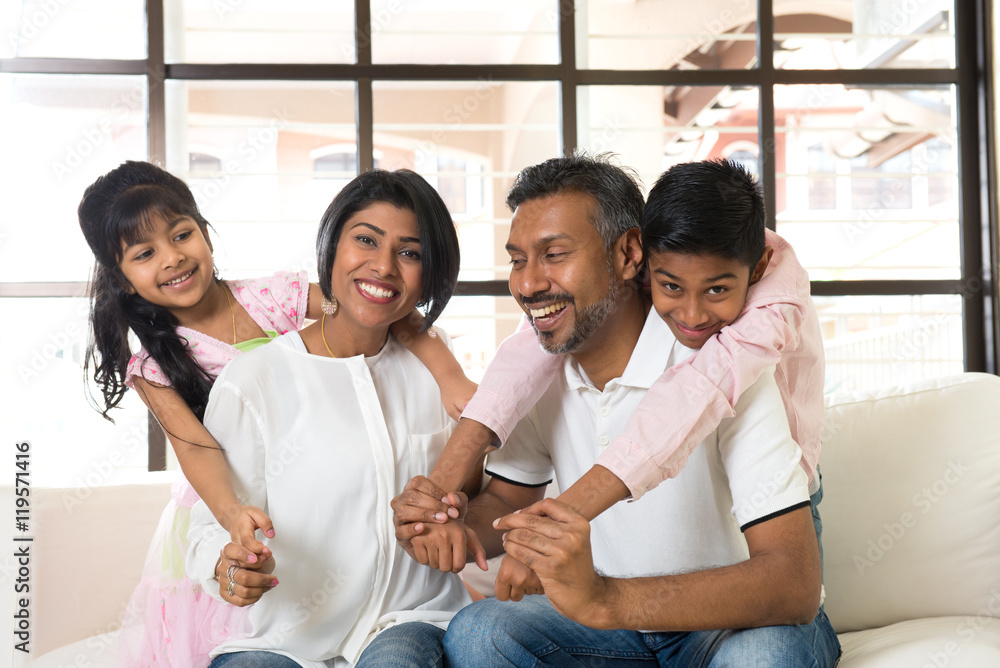 happy indian family at living room happy indian family at living room