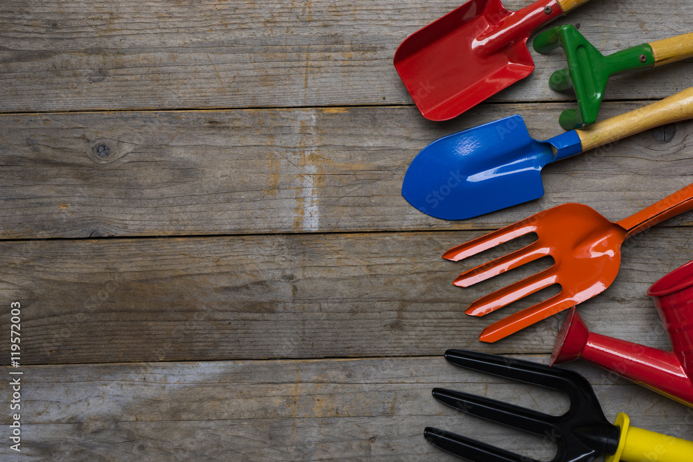 Gardening tools on wood table Gardening tools on wood table