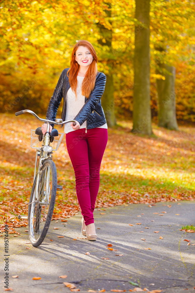 Fototapeta premium Fashionable girl with bike.