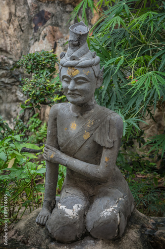 Contortionist hermit  statue in wat pho   Bangkok Thailand.