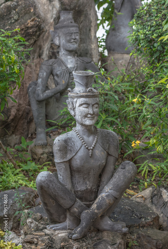 Contortionist hermit  statue in wat pho  Bangkok Thailand.
