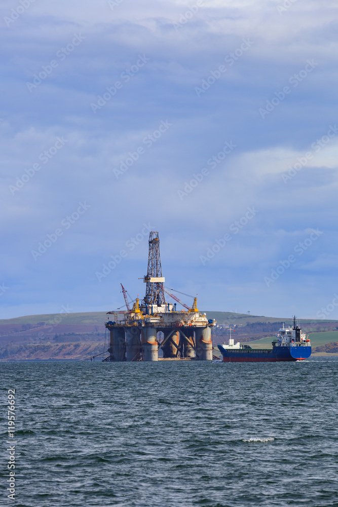 Semi Submersible Oil Rig at Cromarty Firth during Sunset Time in Semi Submersible Oil Rig at Cromarty Firth during Sunset Time in