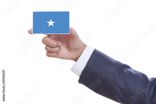 Businessman holding a business card with Somalia Flag 