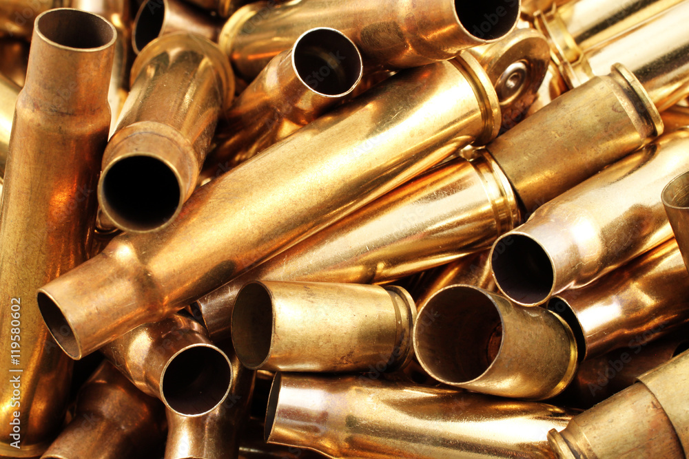 Naklejka premium Empty Bullet Casings Close Up