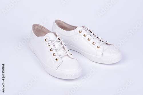 Women's sport leather shoes on white background