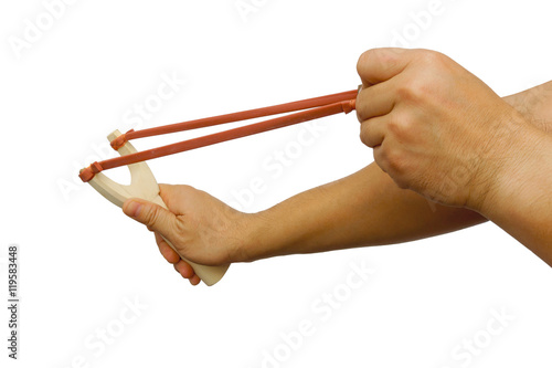 Catapult slingshot isolated on white background with hand pulling