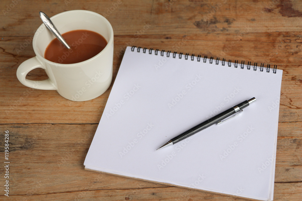 Coffee and blank note. Coffee and blank note.