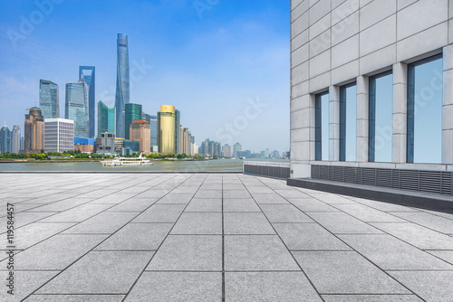 Wallpaper Mural abstract building wall with city skyline background,shanghai,china. Torontodigital.ca