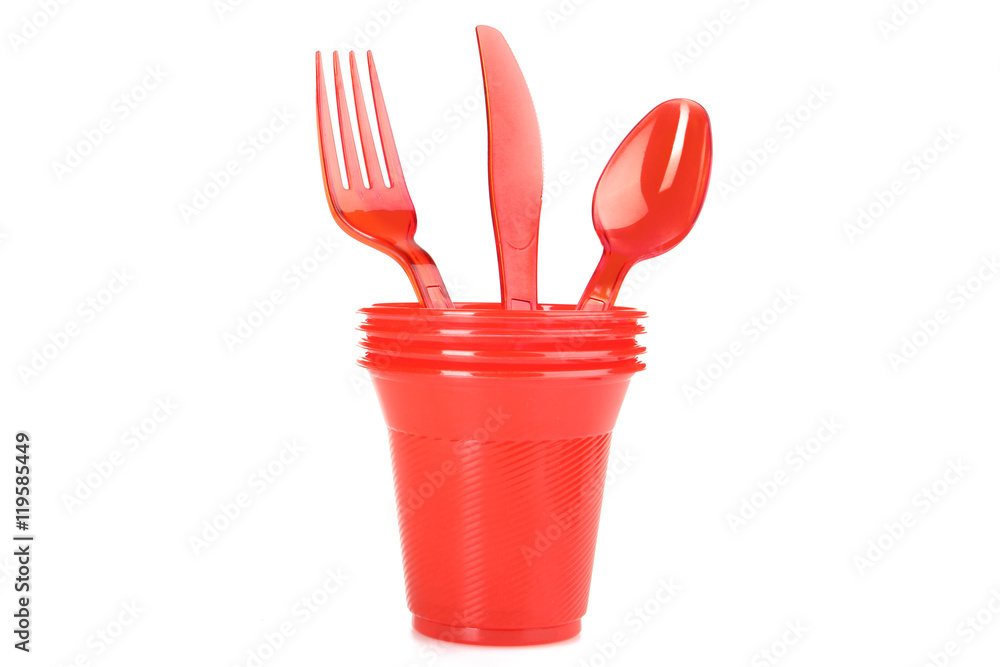 Plastic tableware on a white isolated background Plastic tableware on a white isolated background