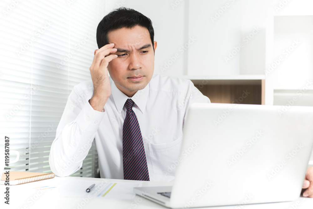 Businessman getting stressed (upset) at work Businessman getting stressed (upset) at work