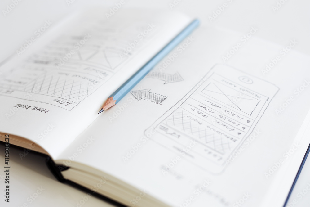 Pencil lying on an open diary Pencil lying on an open diary