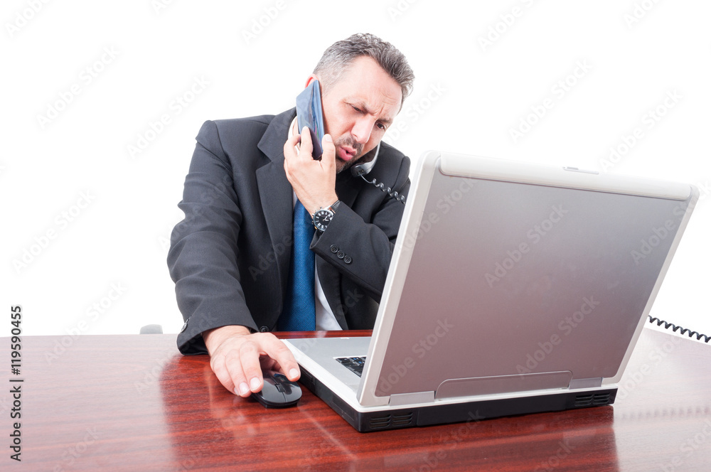 Occupied broker using both telephone and mobile phone Occupied broker using both telephone and mobile phone