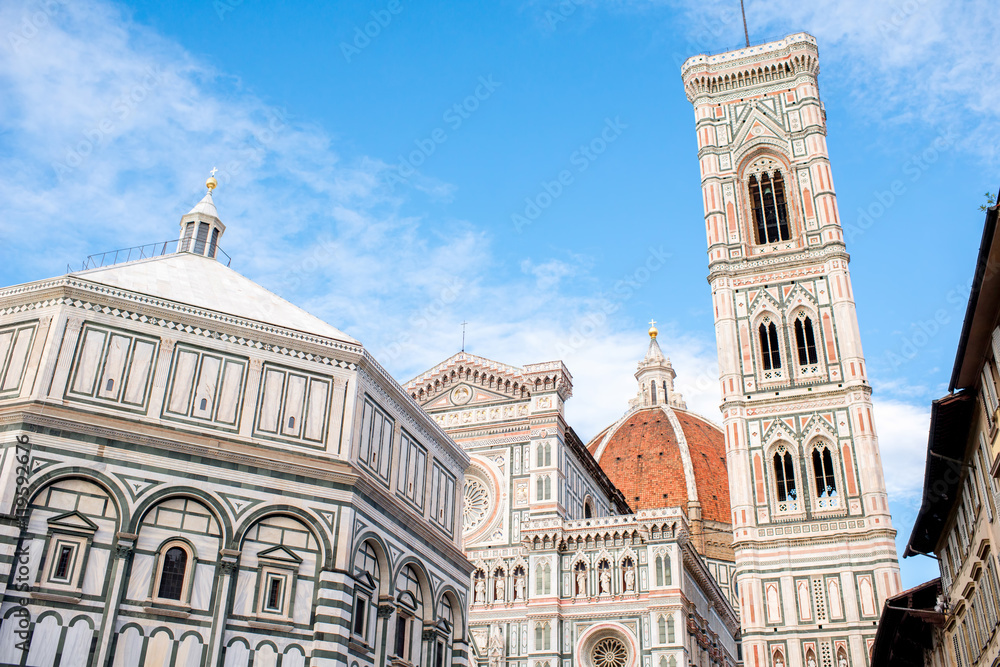 Famous Santa Maria del Fiore cathedral church with Baptistery in Florence. View from below