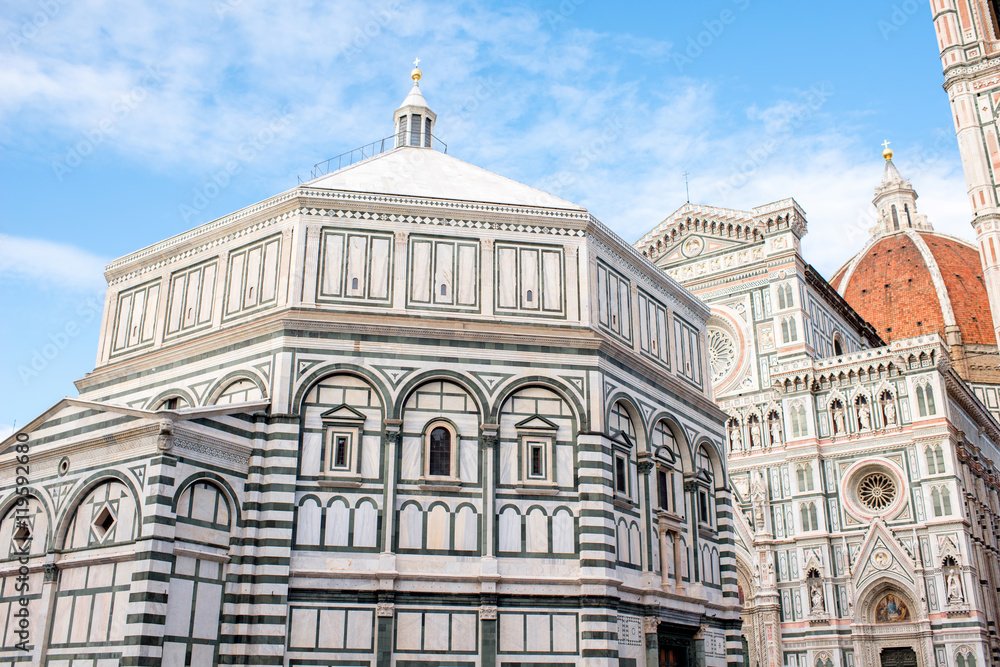 Famous Santa Maria del Fiore cathedral church with Baptistery in Florence. Close-up view from below