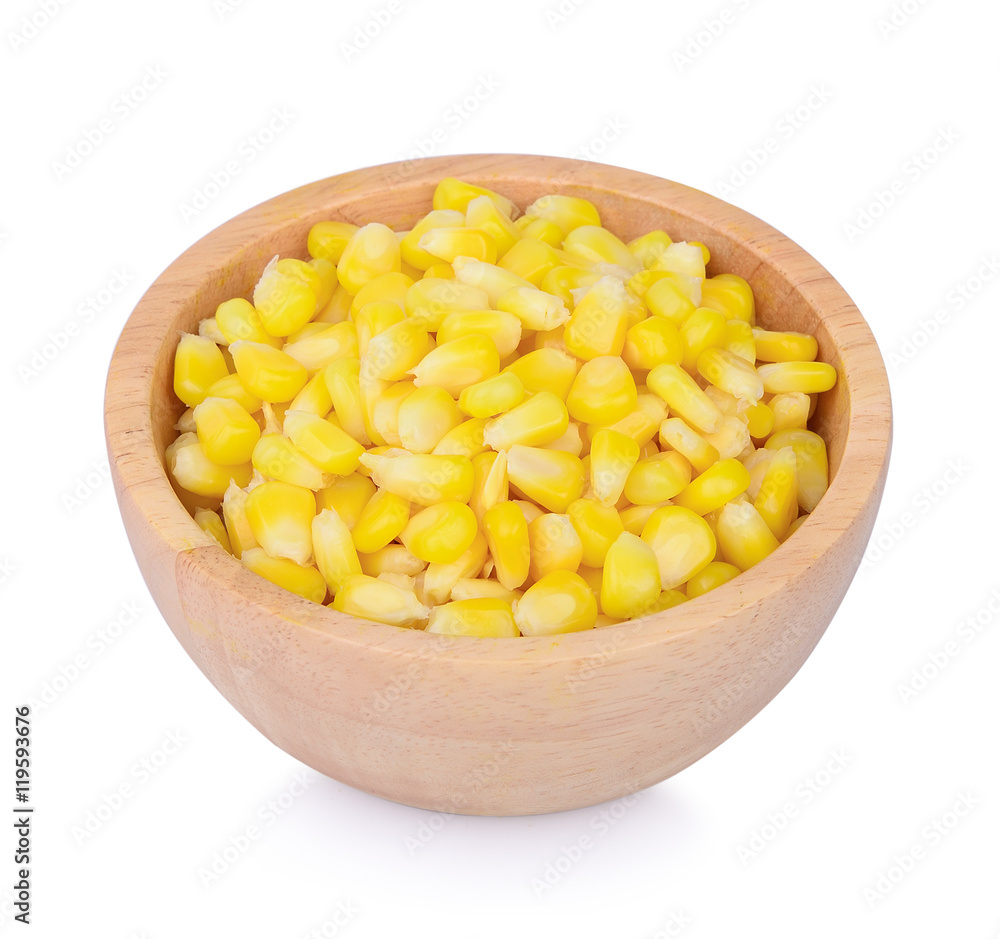 Sweet corn in wooden bowl isolated on white Sweet corn in wooden bowl isolated on white
