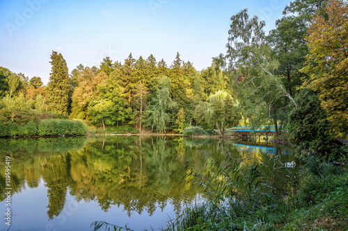 Autumn park.  Leaf fall. Lake. photo