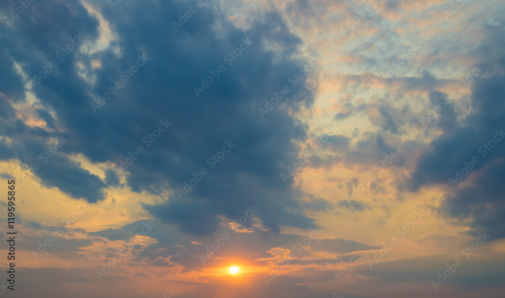 The beautiful stream of cloud on the background of sunset