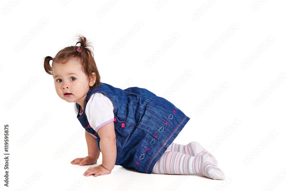 Girl one year creeps on a white background Girl one year creeps on a white background
