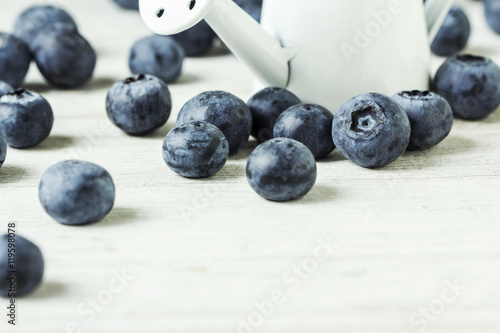 Fresh blueberries on the wooden table