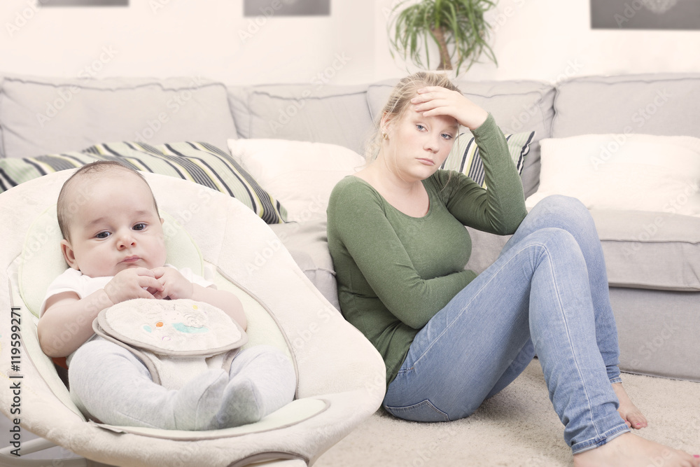 Young new mother suffering from postpartum depression Young new mother suffering from postpartum depression
