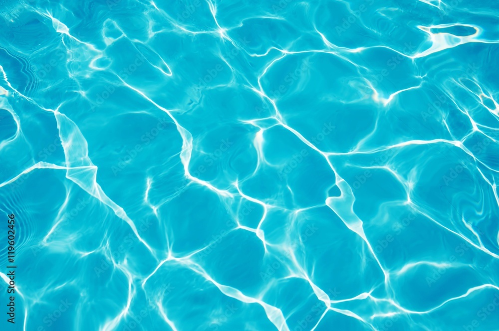 Blue water surface with sun reflection Blue water surface with sun reflection
