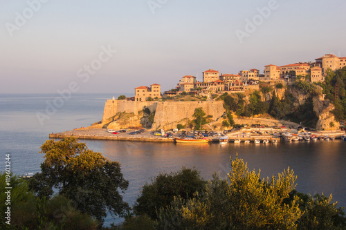 Sunrise landscape of small old town Ulcinj in Montenegro at adriatic sea