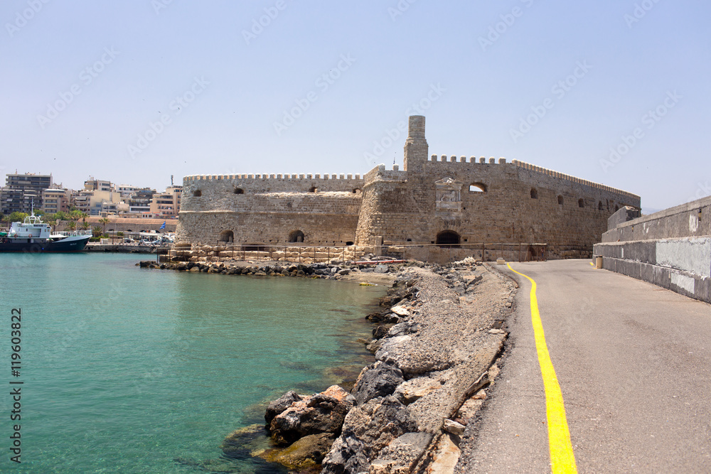 Old protection fortress in the town on the seashore