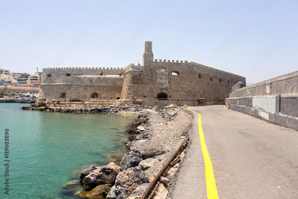 Old protection fortress in the town on the seashore