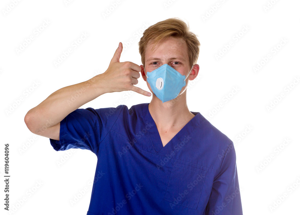 Portrait of a charming medical doctor gesturing call me with his Portrait of a charming medical doctor gesturing call me with his