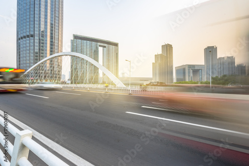 City road with moving car tianjin china.