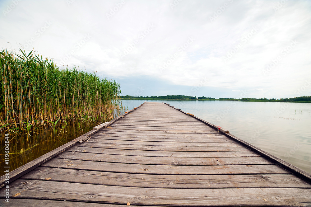 Fototapeta premium wooden pier over lake